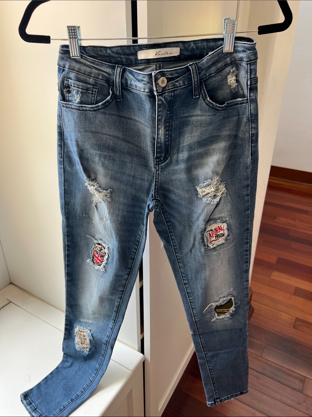 Kancan Women’s Distressed Jeans in Faded Blue with Patch Accents